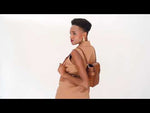 Load and play video in Gallery viewer, A studio video shoot of OCTAVIO WHISKEY CROC 4 WAY BACKPACK, a cute brown backpack with croc look and feel by MDLR

