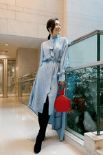 Load image into Gallery viewer, A woman in blue dress carrying ATENA RED PURSE-SLING BAG, a red bag, red handbag, with minimalist look from MDLR
