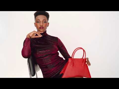 A studio video shoot with MICRO BLANKET PASSION is a micro hot red bag, small bag with a stunning look from MDLR