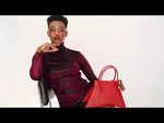 Load and play video in Gallery viewer, A studio video shoot with MICRO BLANKET PASSION is a micro hot red bag, small bag with a stunning look from MDLR
